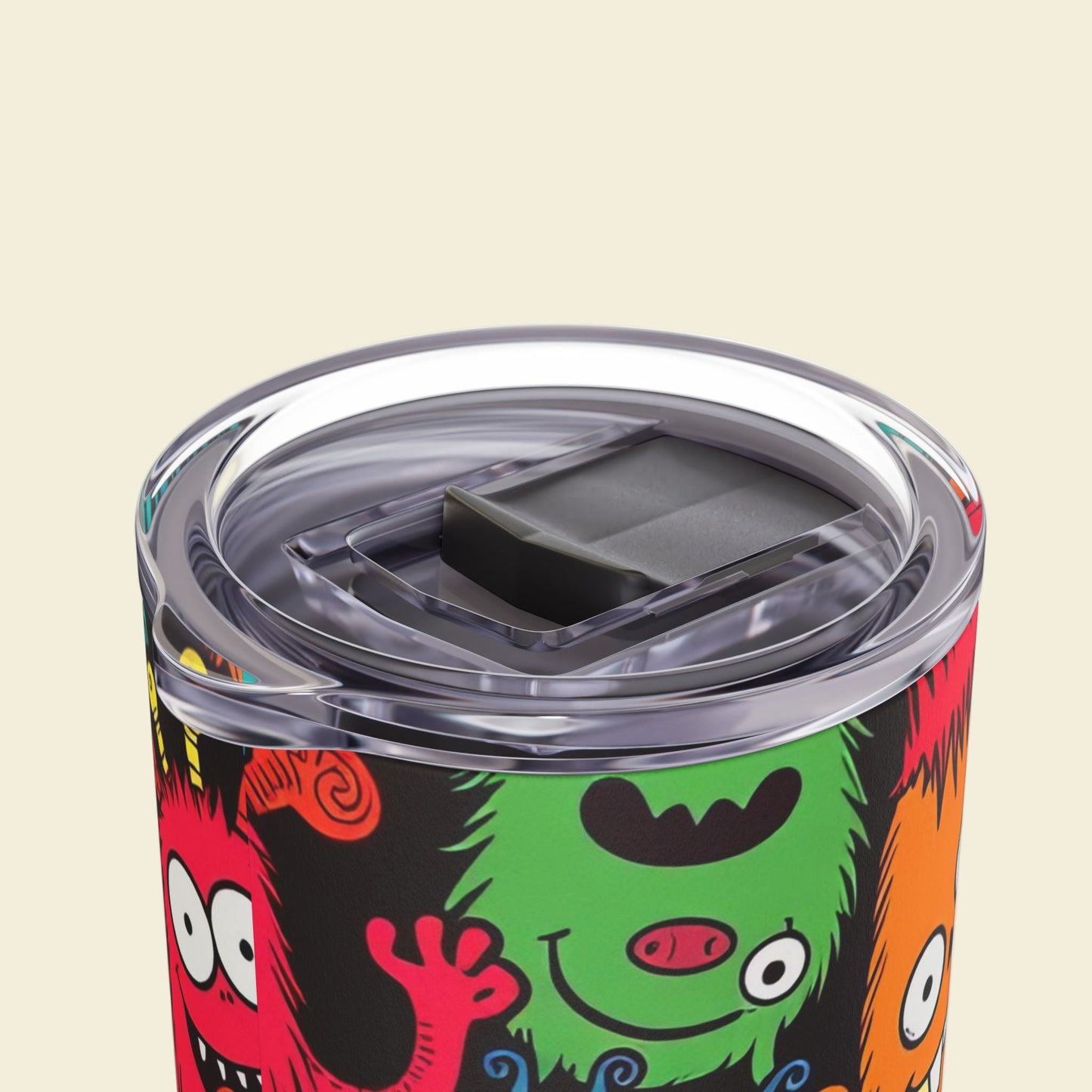 back to school tumbler with cartoon monster design on a beige background