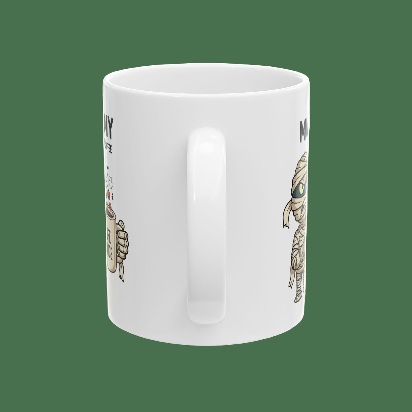 White Halloween mug with illustrations of the handle side of a Halloween mummy mug on a plain background