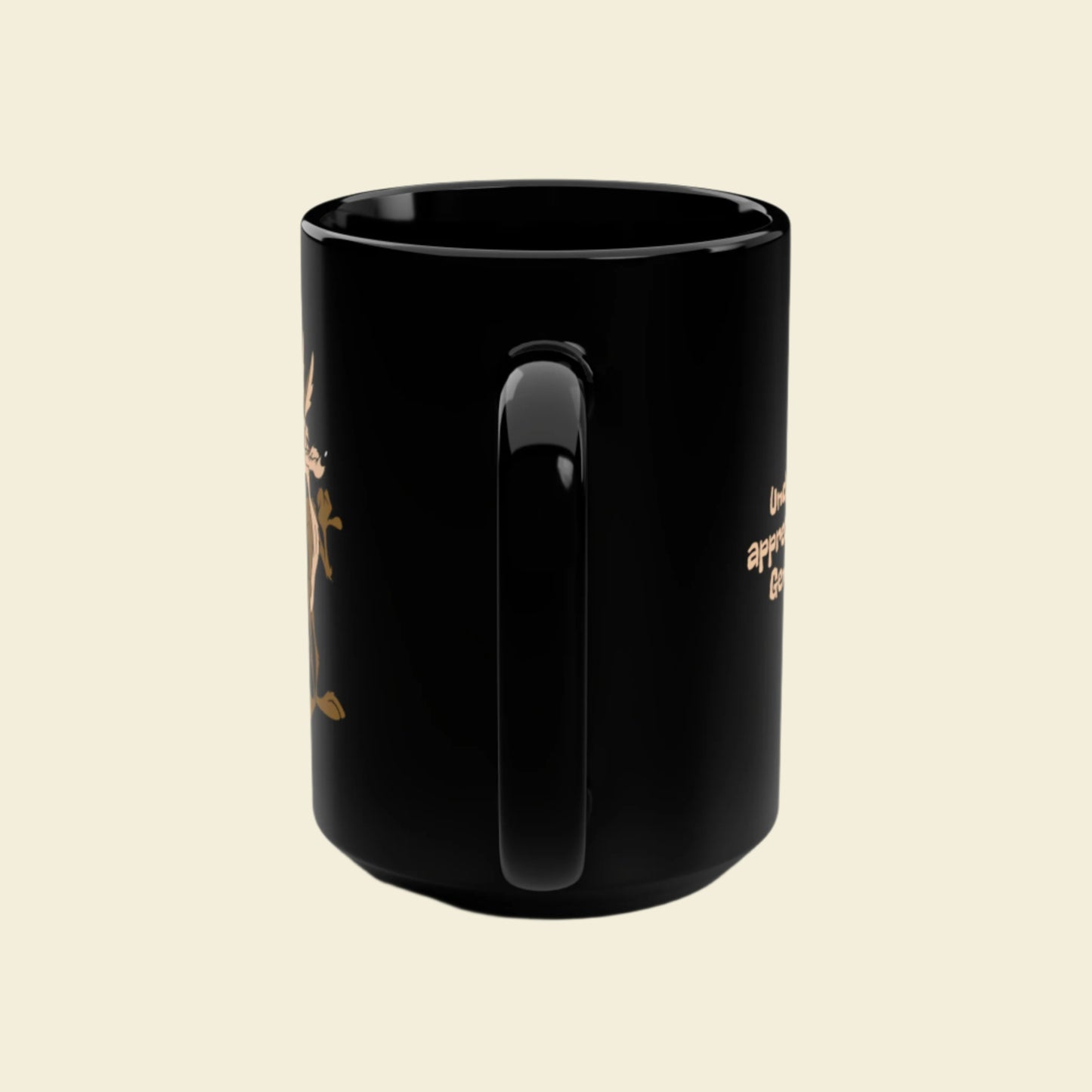 Wile E Coyote Black Coffee Mug. 15 ounce ceramic mug featuring vintage cartoon Coyote, Wile E.
