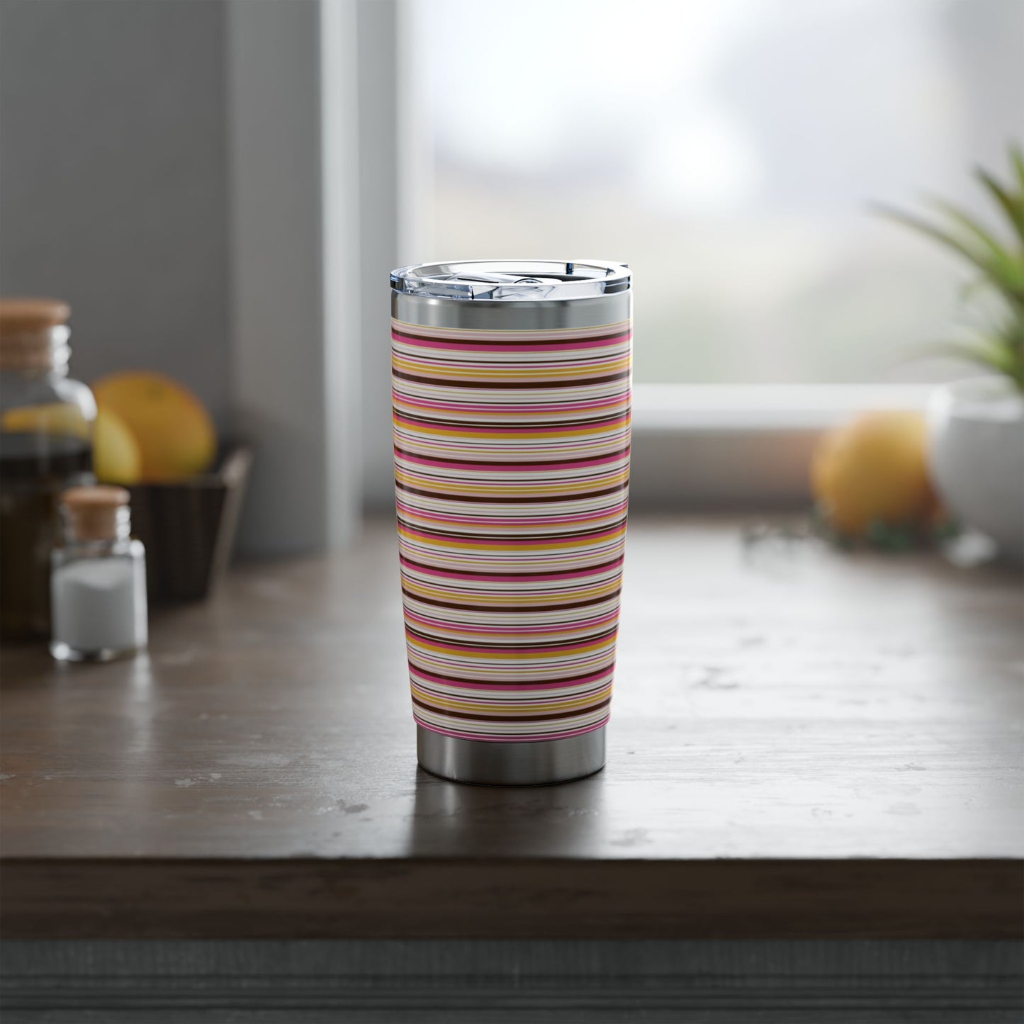 20oz retro stripe stainless steel tumbler with vintage-inspired pink mustard and brown striped design and sliding lid.