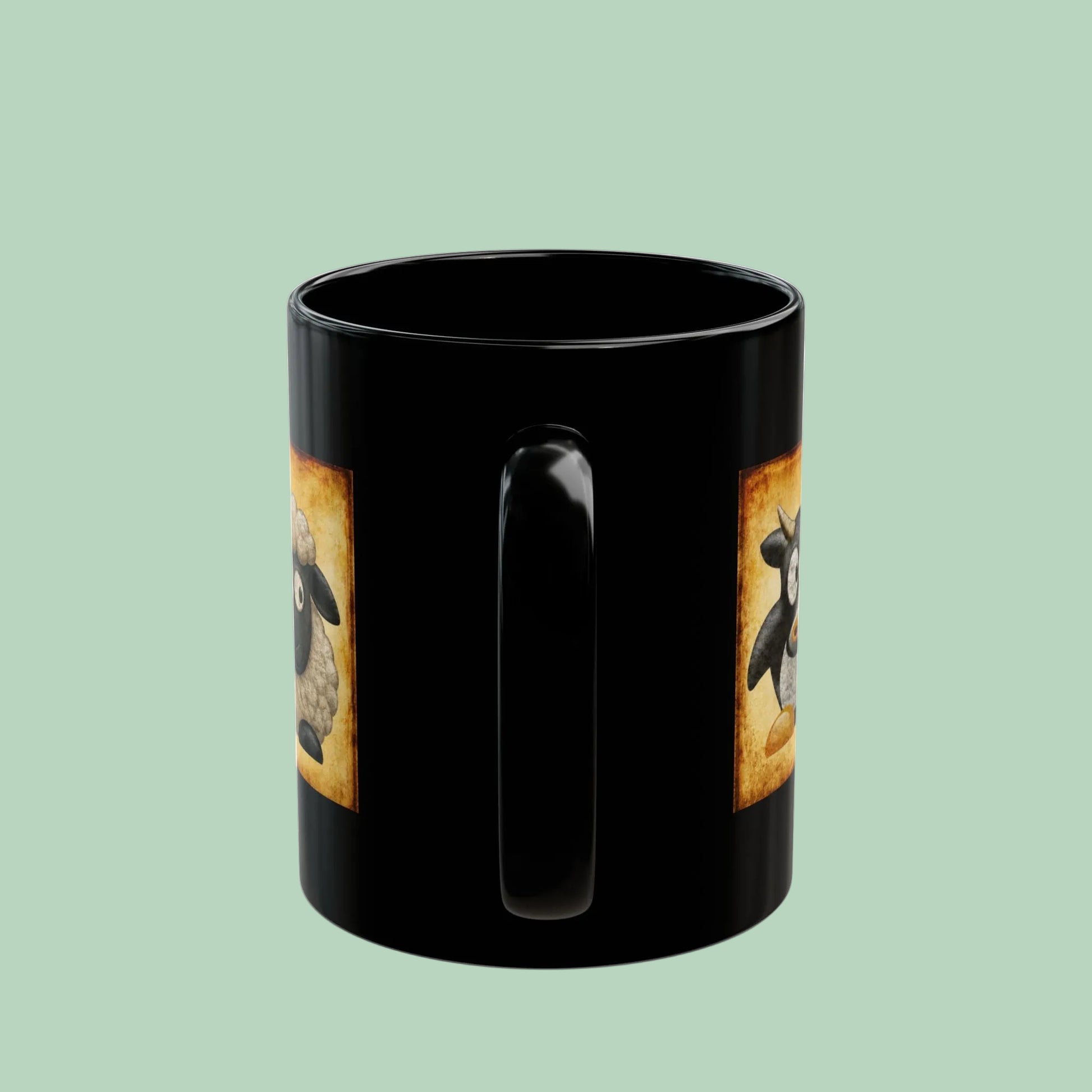 Black ceramic farm animal coffee mug featuring vintage goat pig and sheep artwork on a farmhouse-inspired design.