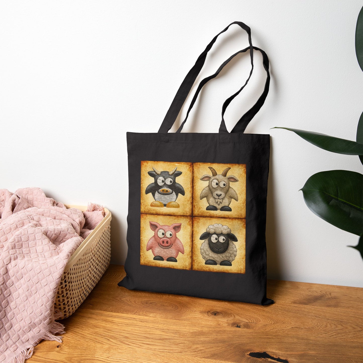 Black cotton canvas tote bag featuring vintage farm animal artwork with cow, goat, pig and sheep illustrations