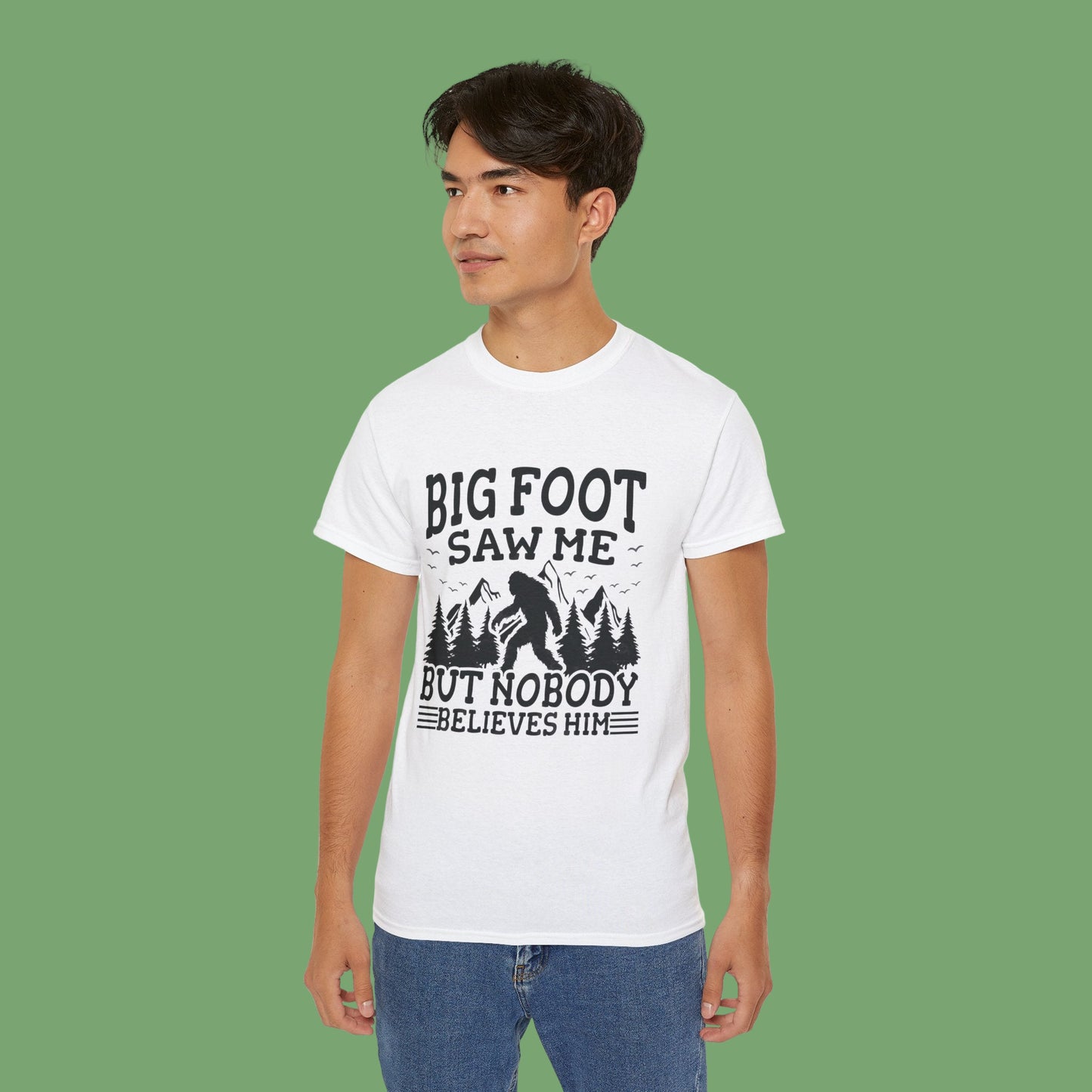 Person wearing a white t-shirt with 'Big Foot saw me but nobody believes him' text and graphic.