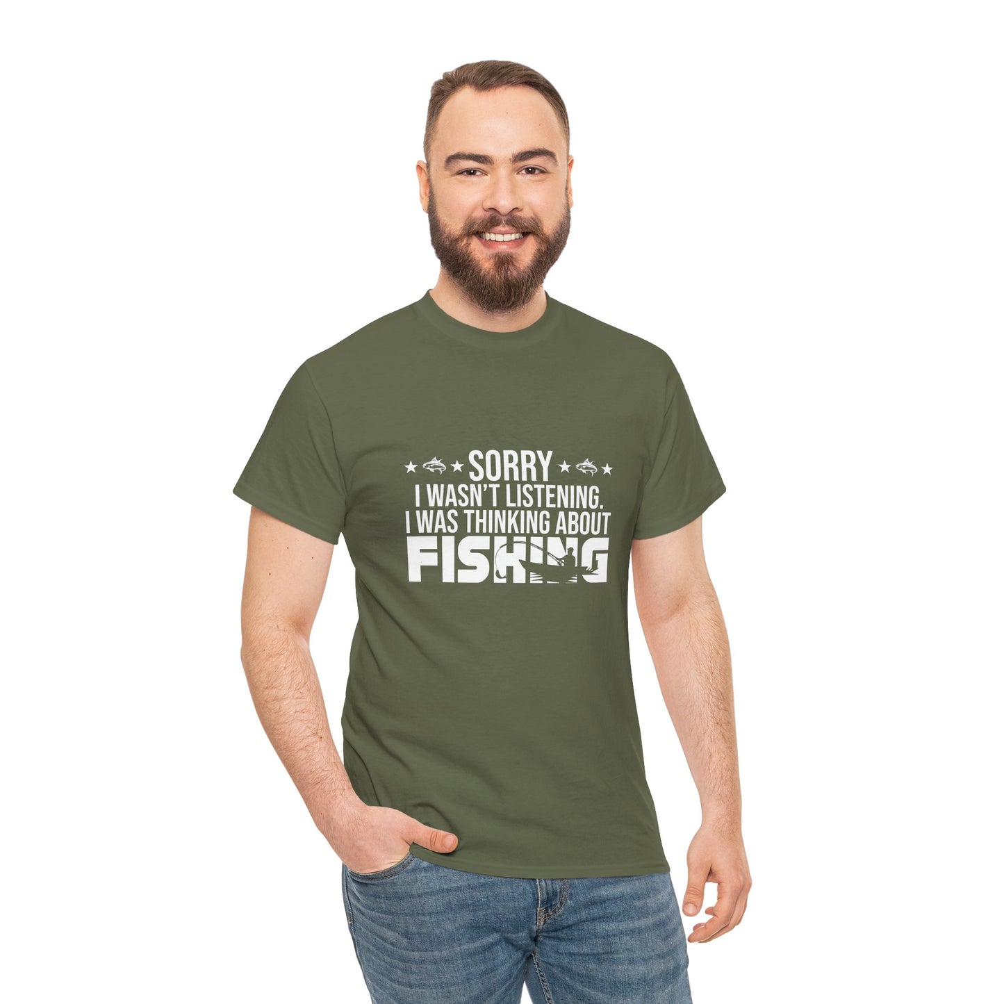 Man wearing a green t-shirt with fishing-themed text on a white background