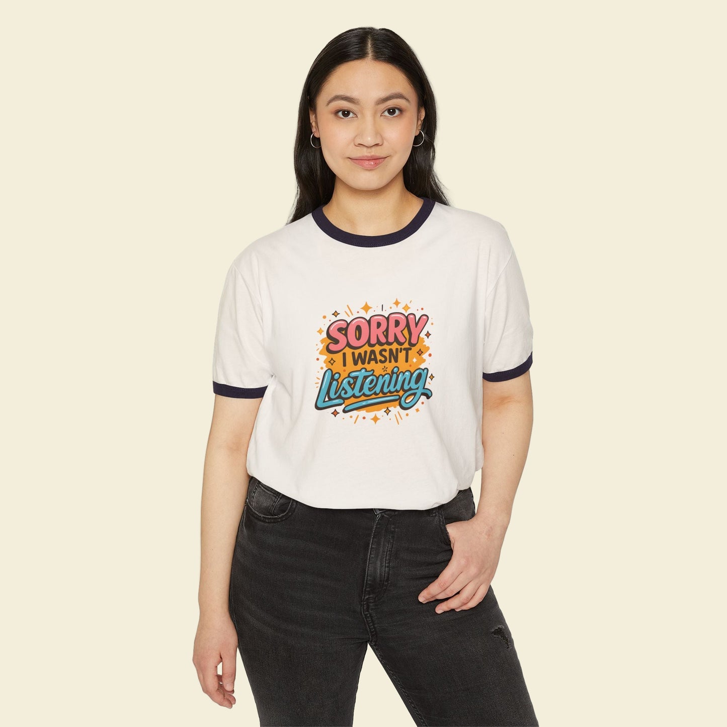 Person wearing a white back to school t-shirt with colorful text design on a white background