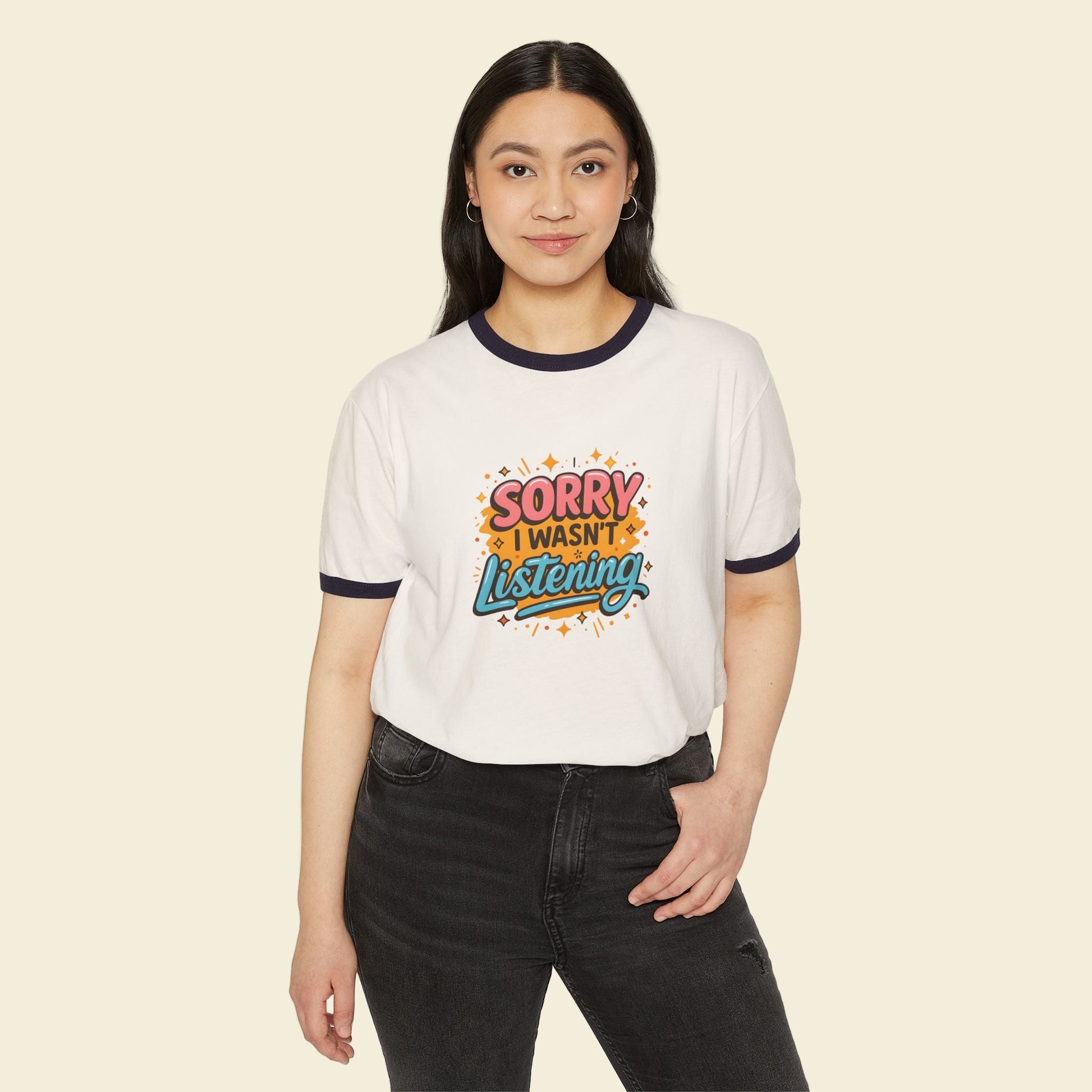 Person wearing a white back to school t-shirt with colorful text design on a white background