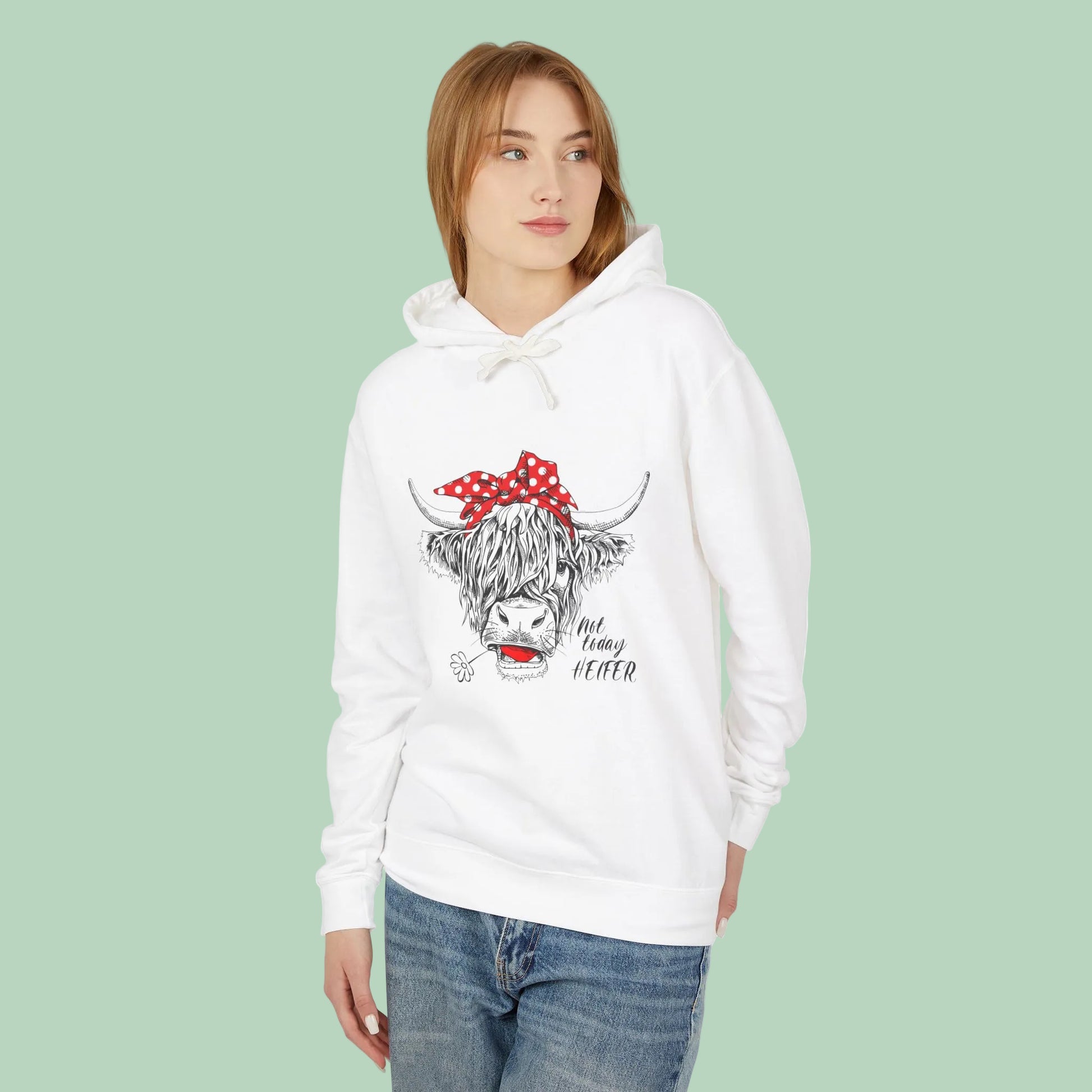 White Highland cow hoodie featuring hand-drawn cow with red polka dot bandana and Not Today Heifer graphic