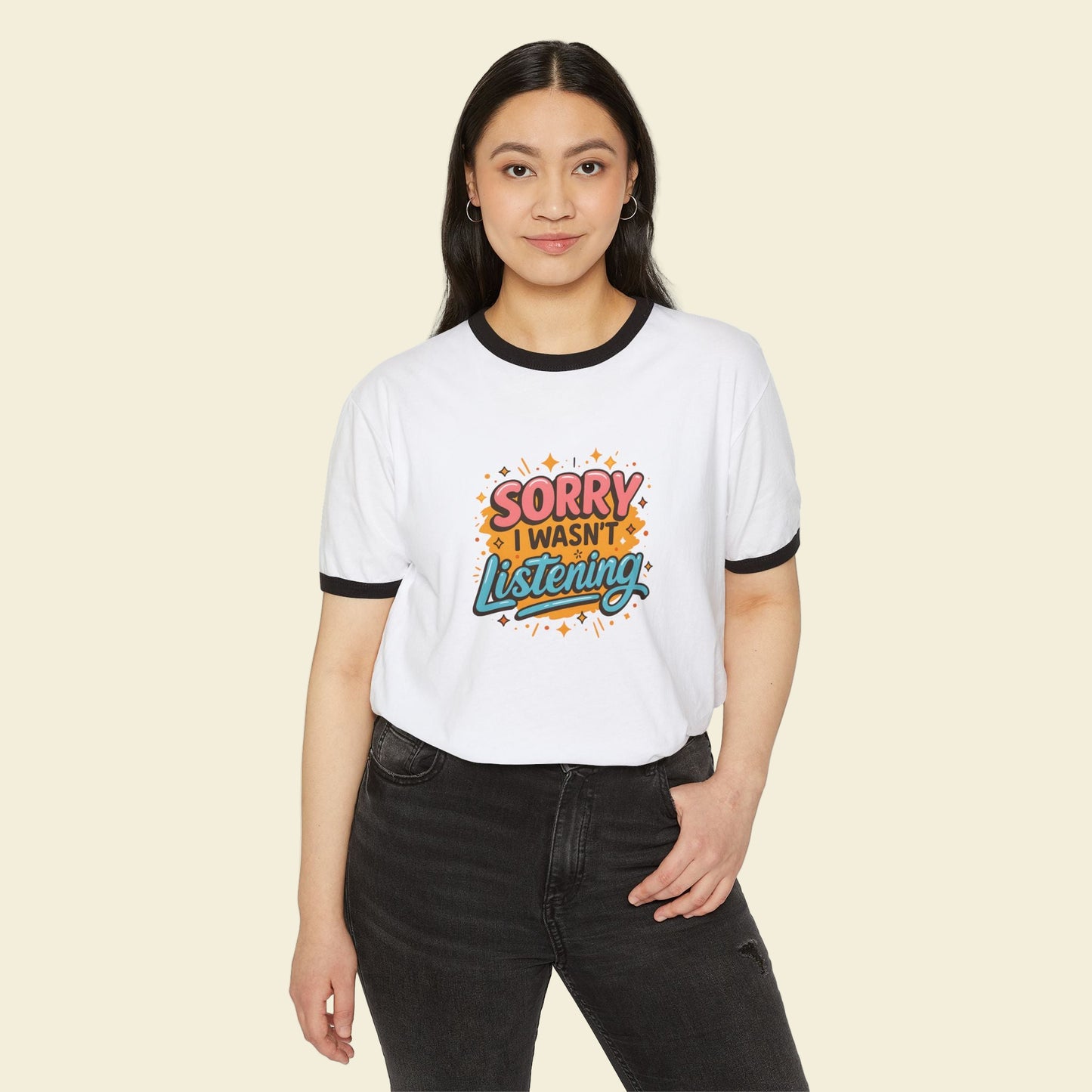 Person wearing a going back to school t-shirt with colorful text design on a white background