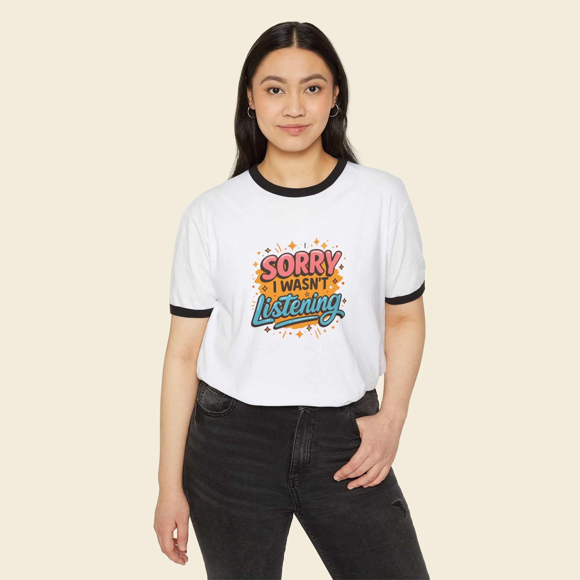 Person wearing a going back to school t-shirt with colorful text design on a white background
