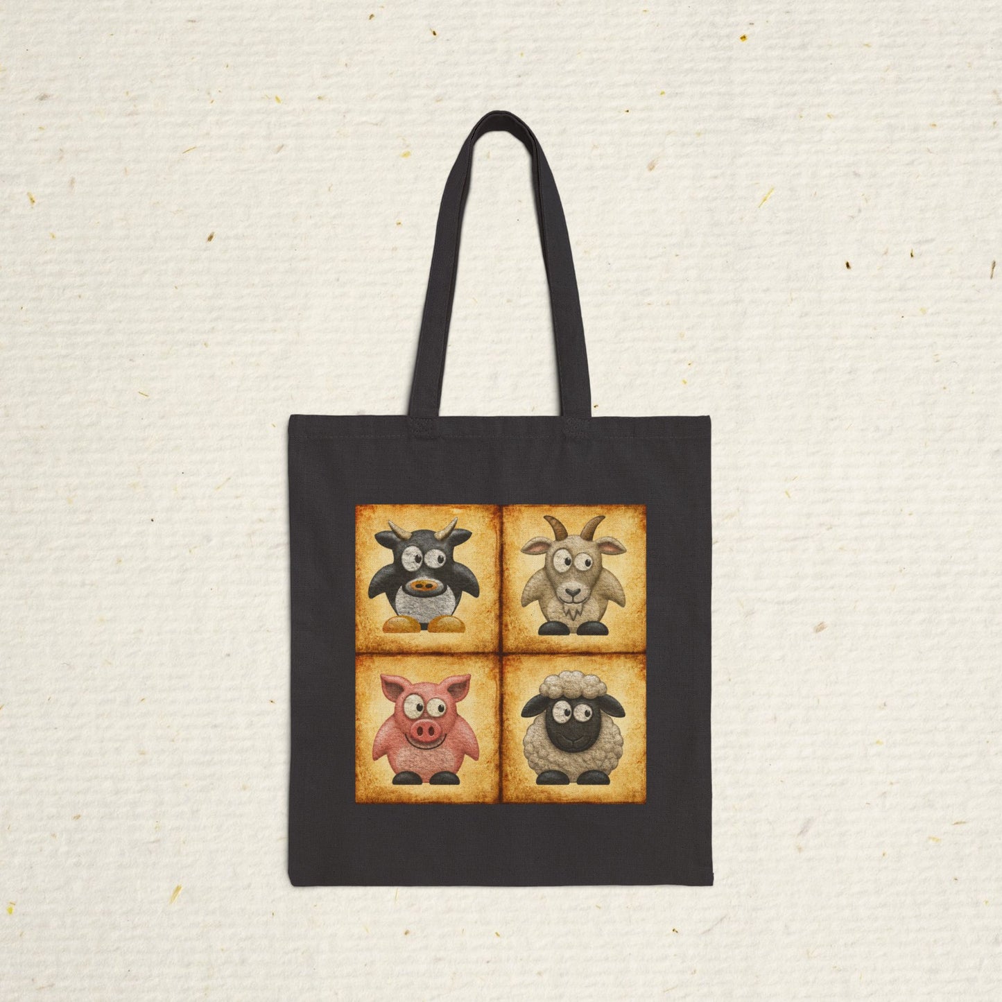 Black cotton canvas tote bag featuring vintage farm animal artwork with cow, goat, pig and sheep illustrations