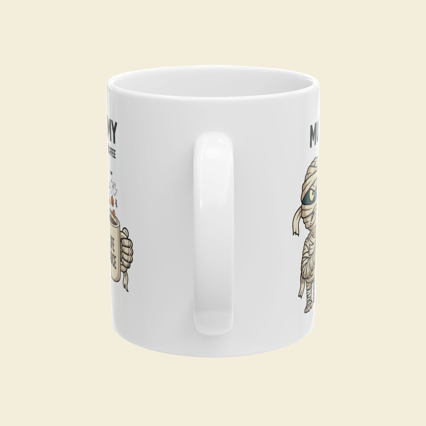 White Halloween mug with illustrations of the handle side of a Halloween mummy mug on a plain background