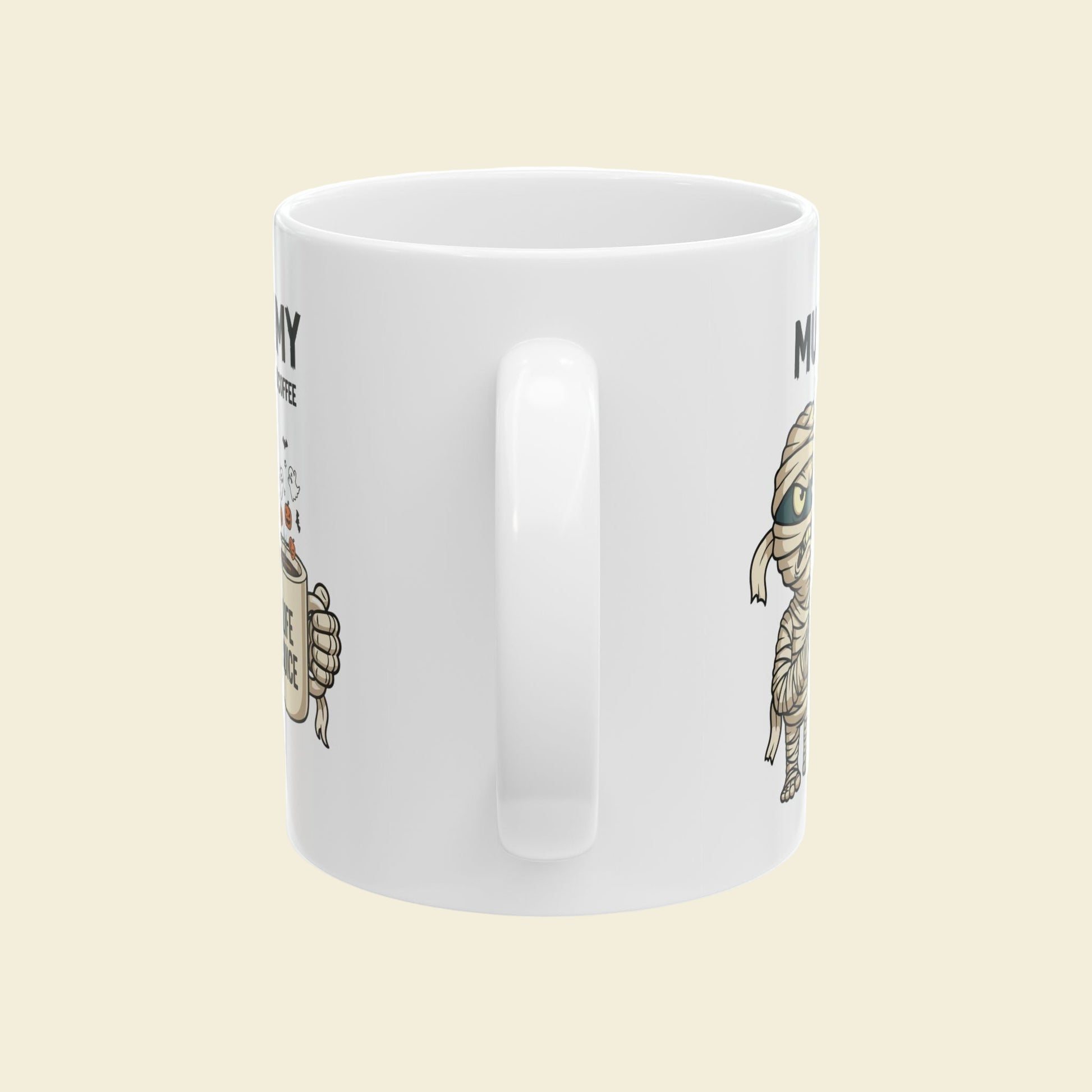 White Halloween mug with illustrations of the handle side of a Halloween mummy mug on a plain background