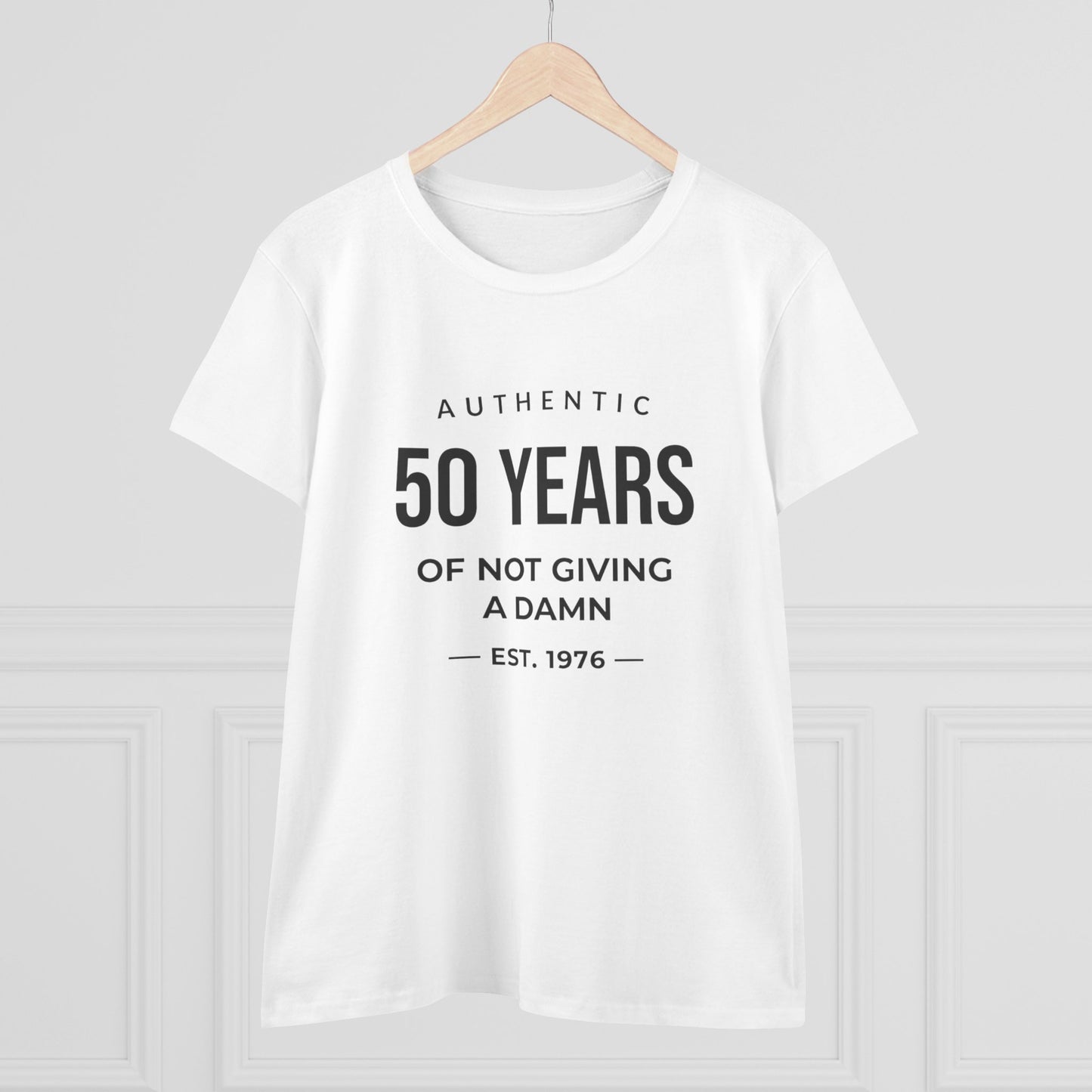 Women's funny 50th birthday t-shirt featuring Authentic 50 Years of Not Giving a Damn Est. 1976 graphic
