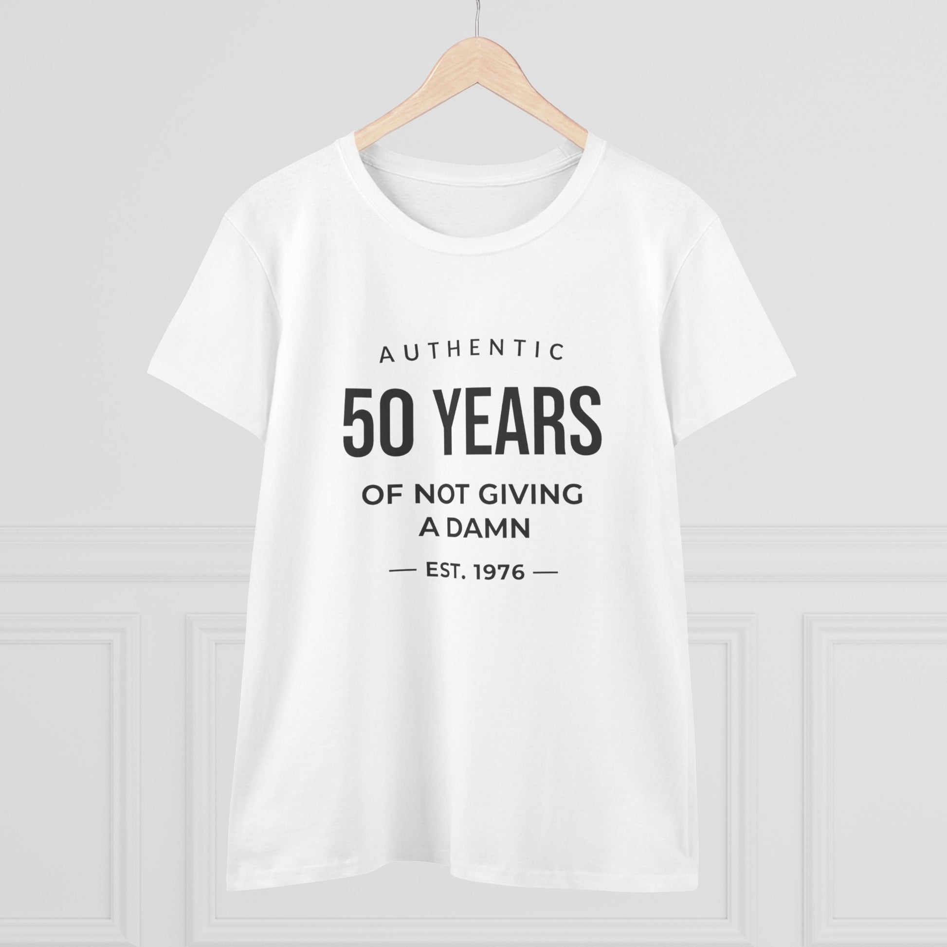 Women's funny 50th birthday t-shirt featuring Authentic 50 Years of Not Giving a Damn Est. 1976 graphic