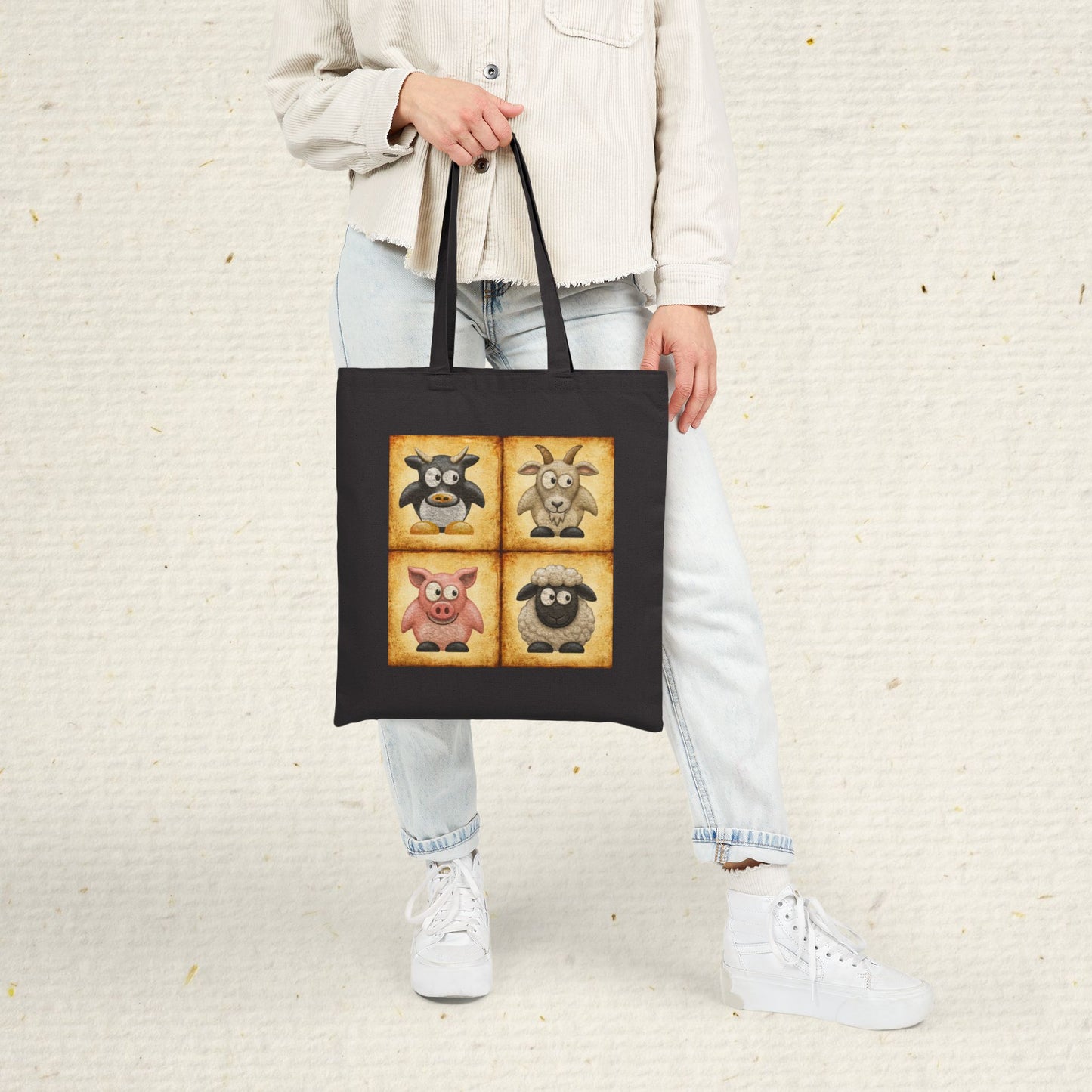 Black cotton canvas tote bag featuring vintage farm animal artwork with cow, goat, pig and sheep illustrations