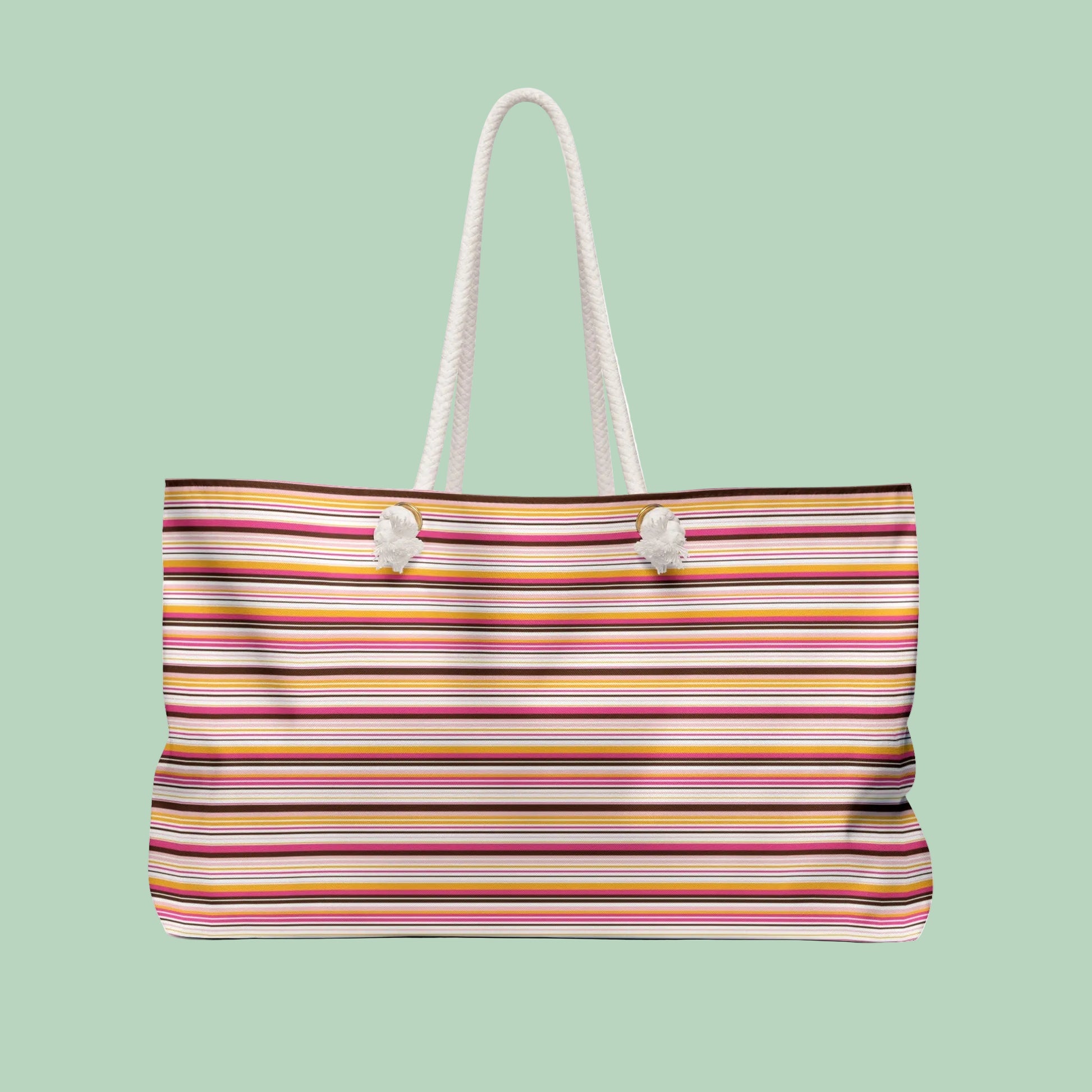Large retro stripe weekender bag with rope handles in pink, amber and cream stripes