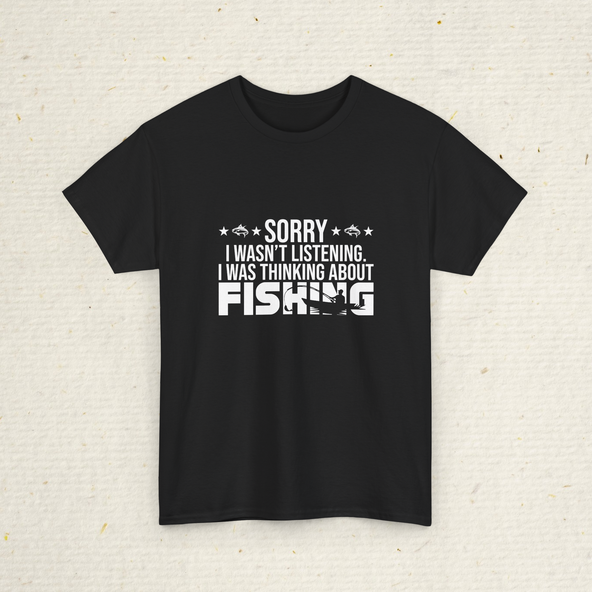 Men's fishing shirt with white text on a textured beige background