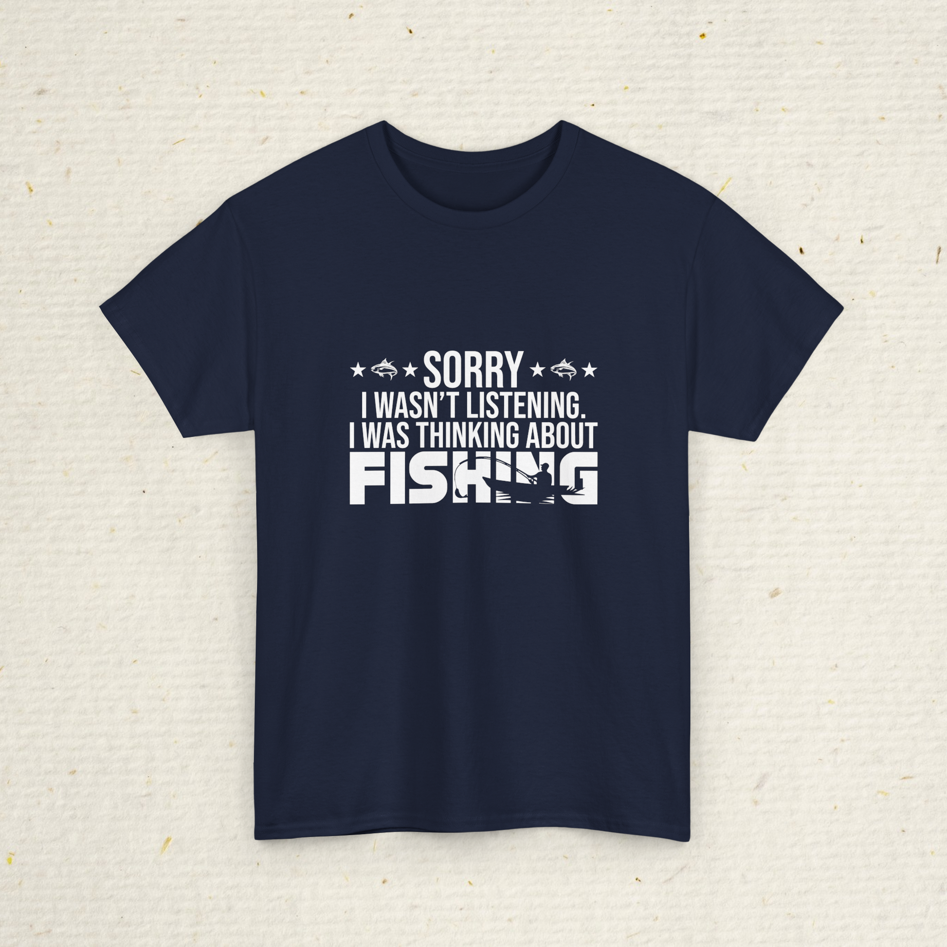 Navy blueMen's fishing t-shirt with white text on a textured beige background