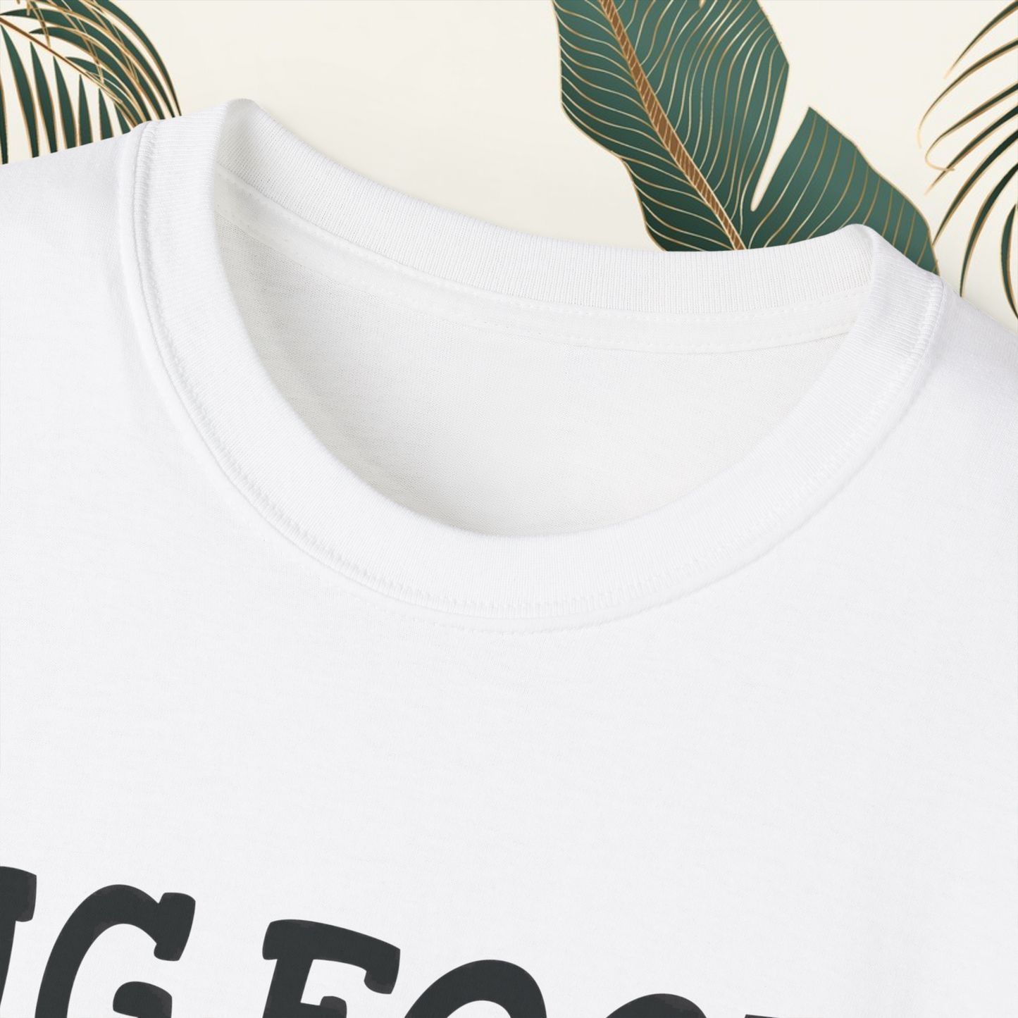 Person wearing a t-shirt with 'Big Foot saw me but nobody believes him' text outdoors.