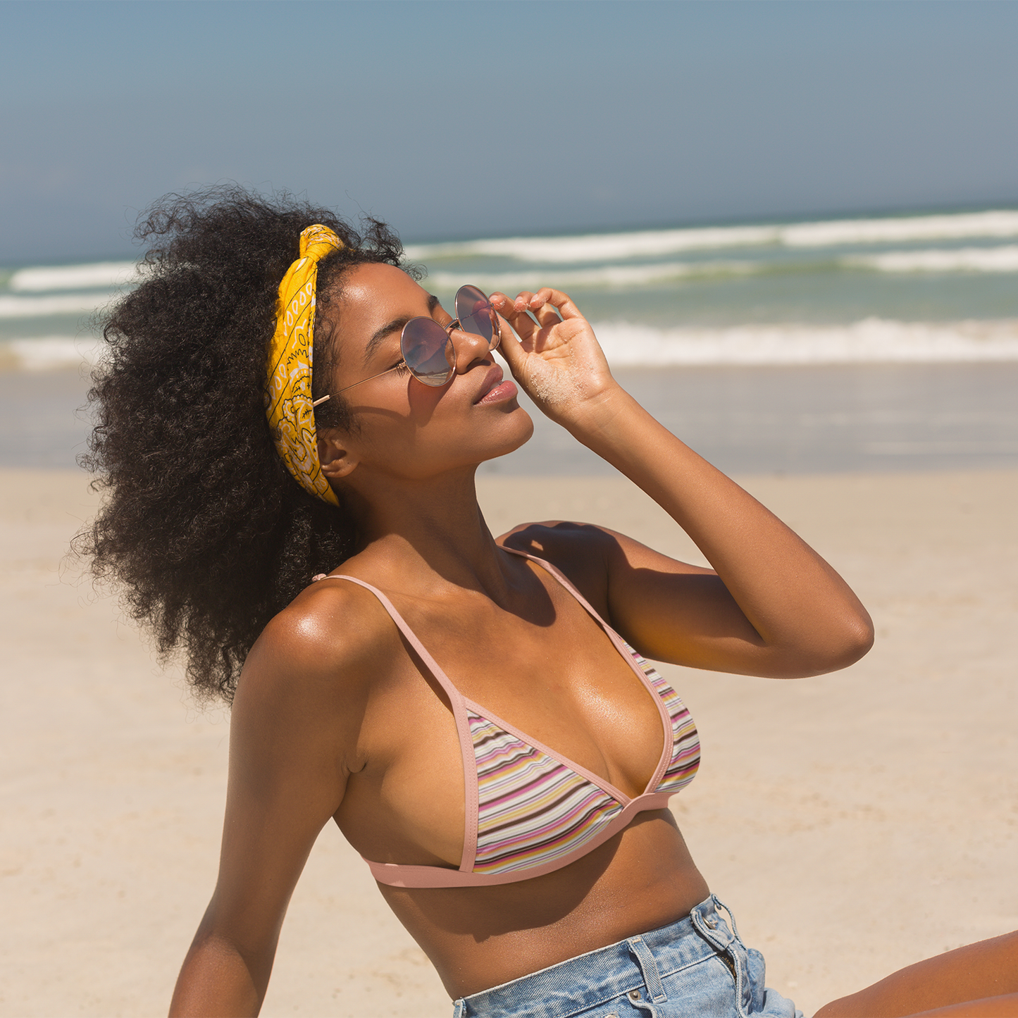 Women's retro stripe triangle bikini set with tie-side bottoms in pink, coral and cream stripes