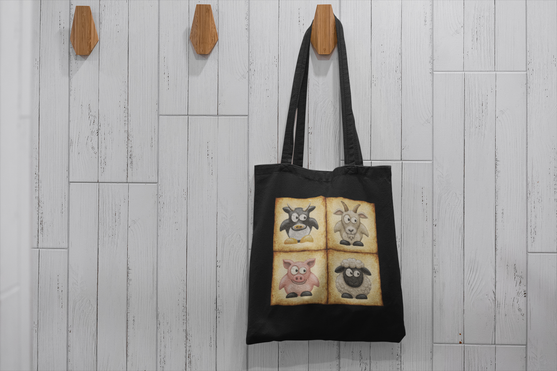 Black cotton canvas tote bag featuring vintage farm animal artwork with cow, goat, pig and sheep illustrations
