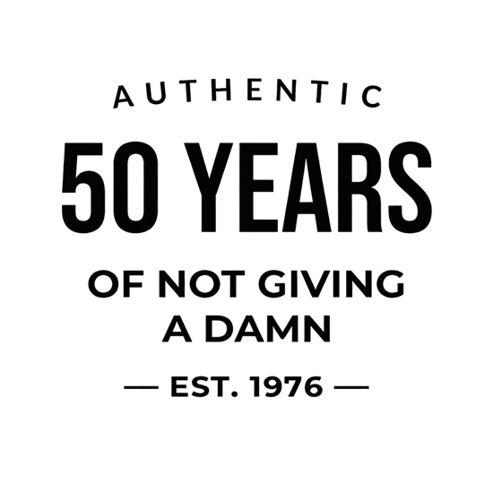 Women's funny 50th birthday t-shirt featuring Authentic 50 Years of Not Giving a Damn Est. 1976 graphic