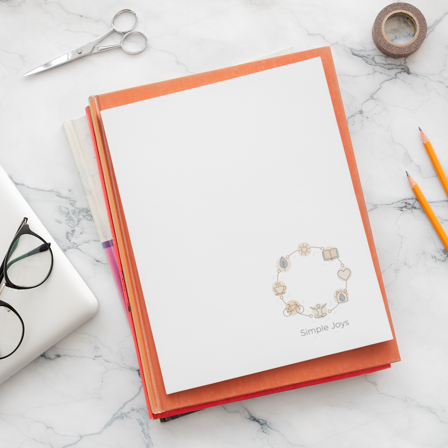 Notebook cover with Minimalist “Simple Joys” one-line art sticker featuring Scandinavian line icons of the sun, leaf, book, tea, heart and bicycle. Aesthetic vinyl sticker perfect for laptops, journals, planners and minimalist decor.